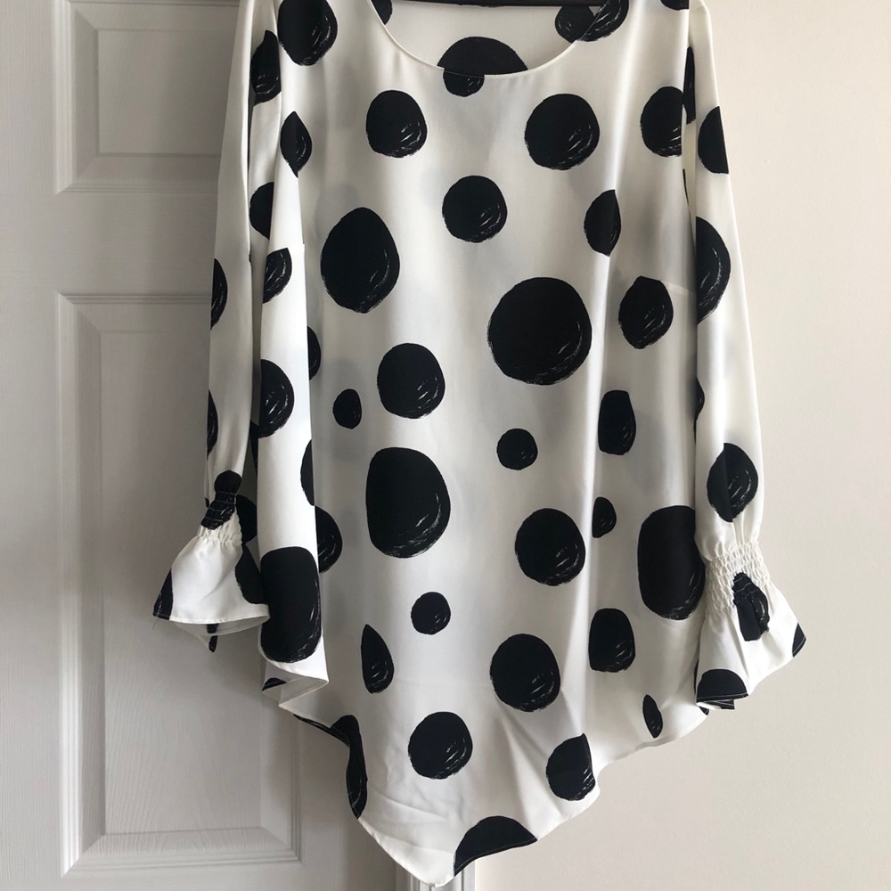 White with black polka dot pointed hem blouse